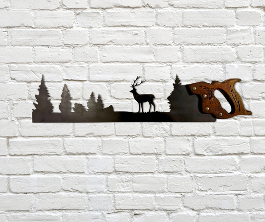 Decorative vintage saw with stag and forest design on a white brick wall.