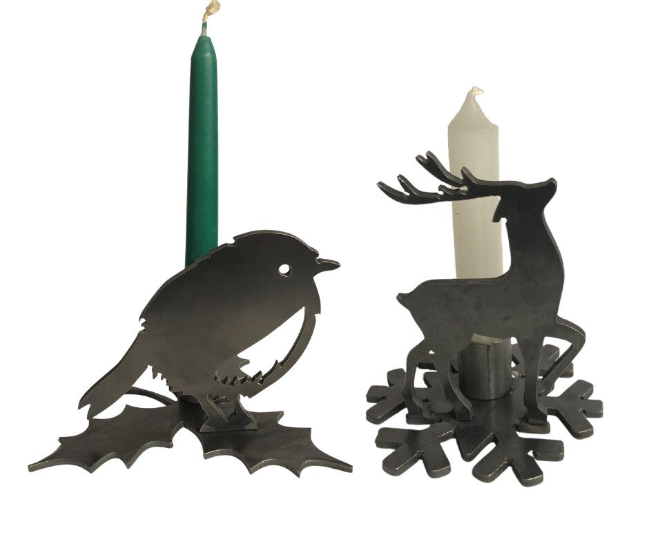 Decorative candle holders shaped like a Rpbin and a reindeer