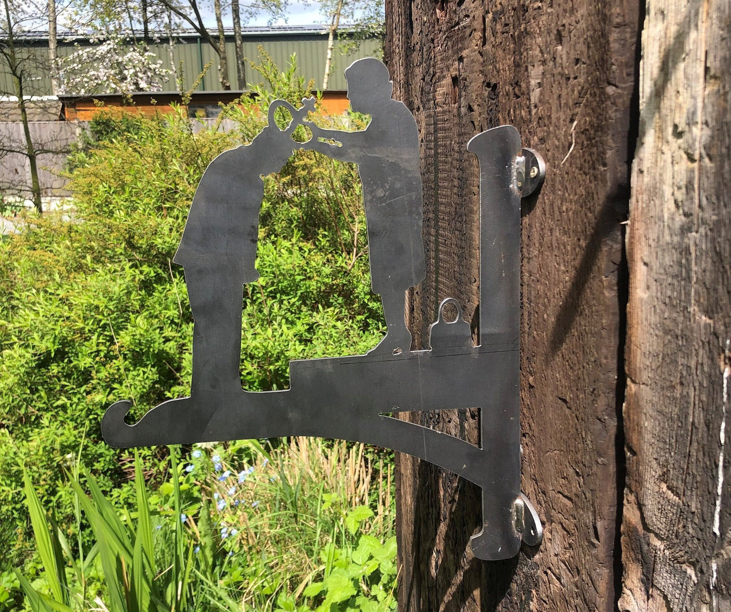 Steel Hanging Basket Bracket of the late Queen Elizabeth ll passing the crown to King Charles