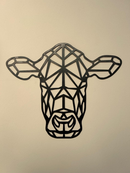 Steel Home and garden decoration of a geometric cows head, mounted on a wall
