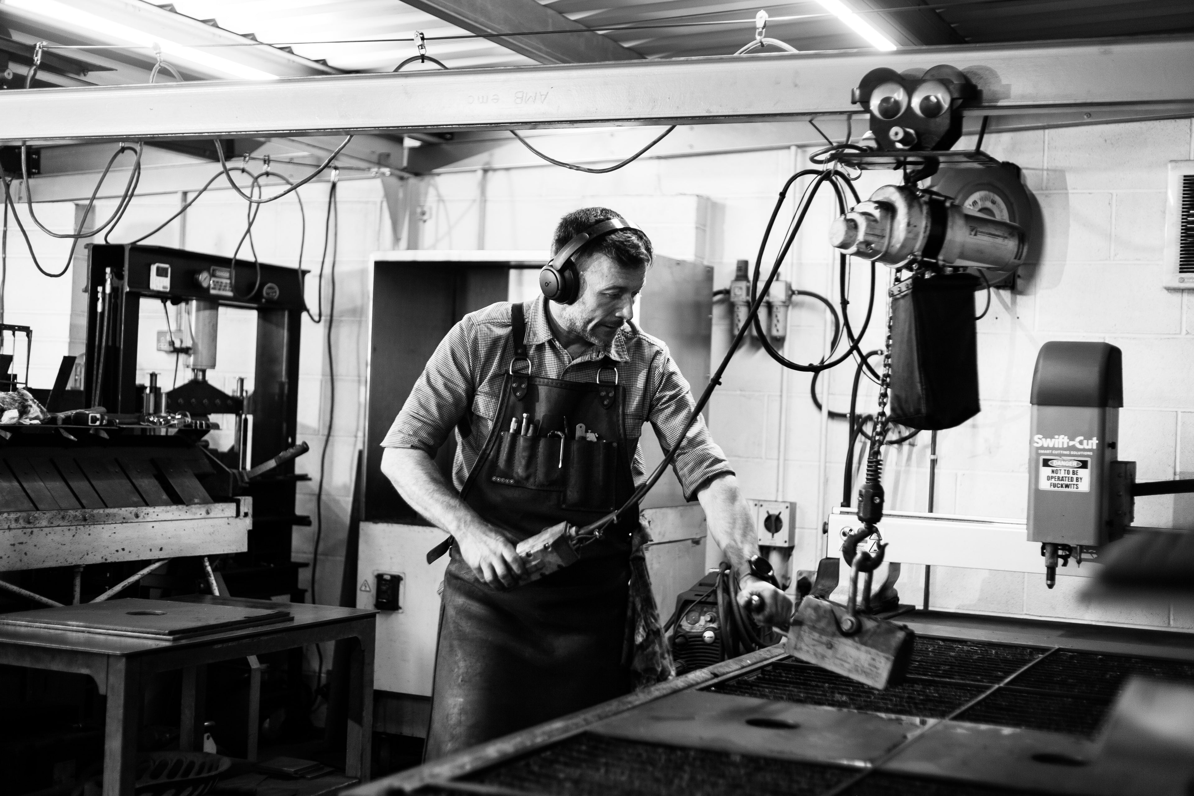 Black and white photo of Tim at work