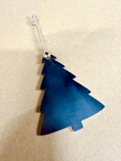 Steel Christmas tree decoration with string attached for hanging.