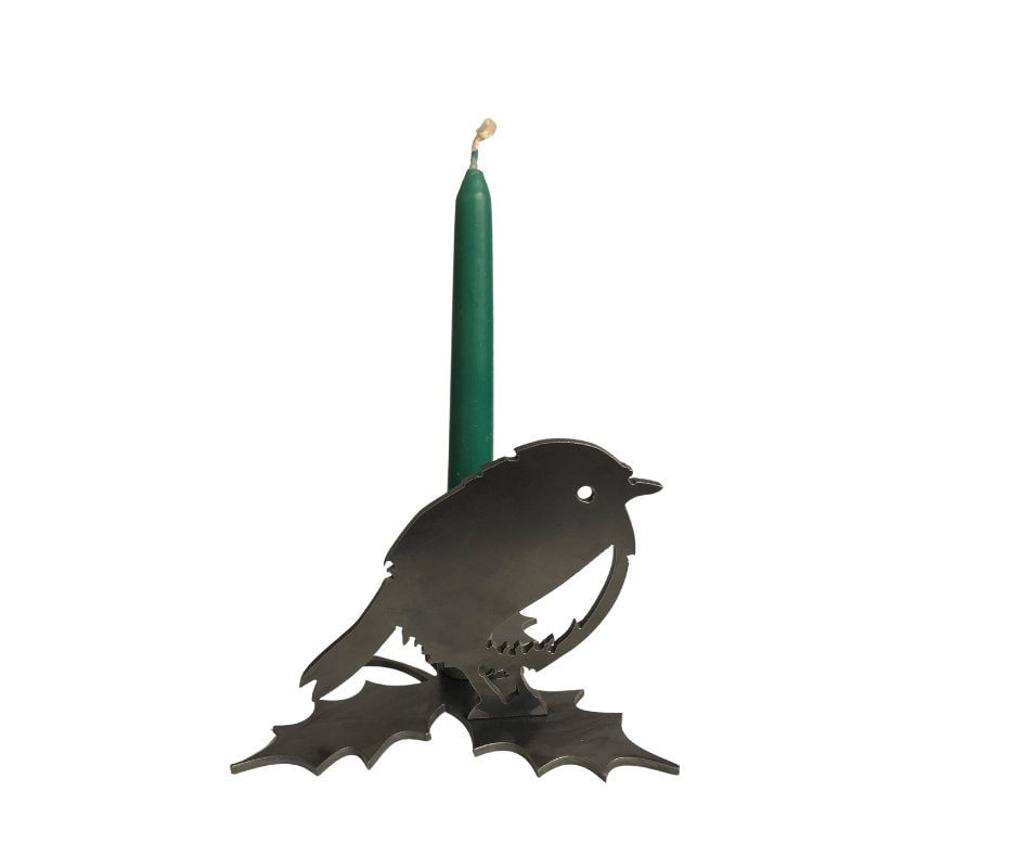 Robin candle holder with a green candle on a white background