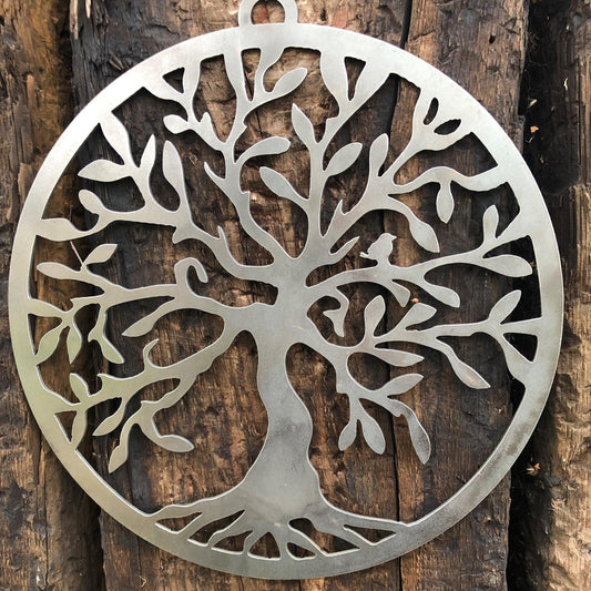 Steel Tree of life design on wooden background